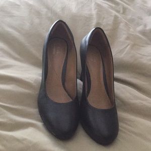 Brand new Clark’s pumps.  Never word